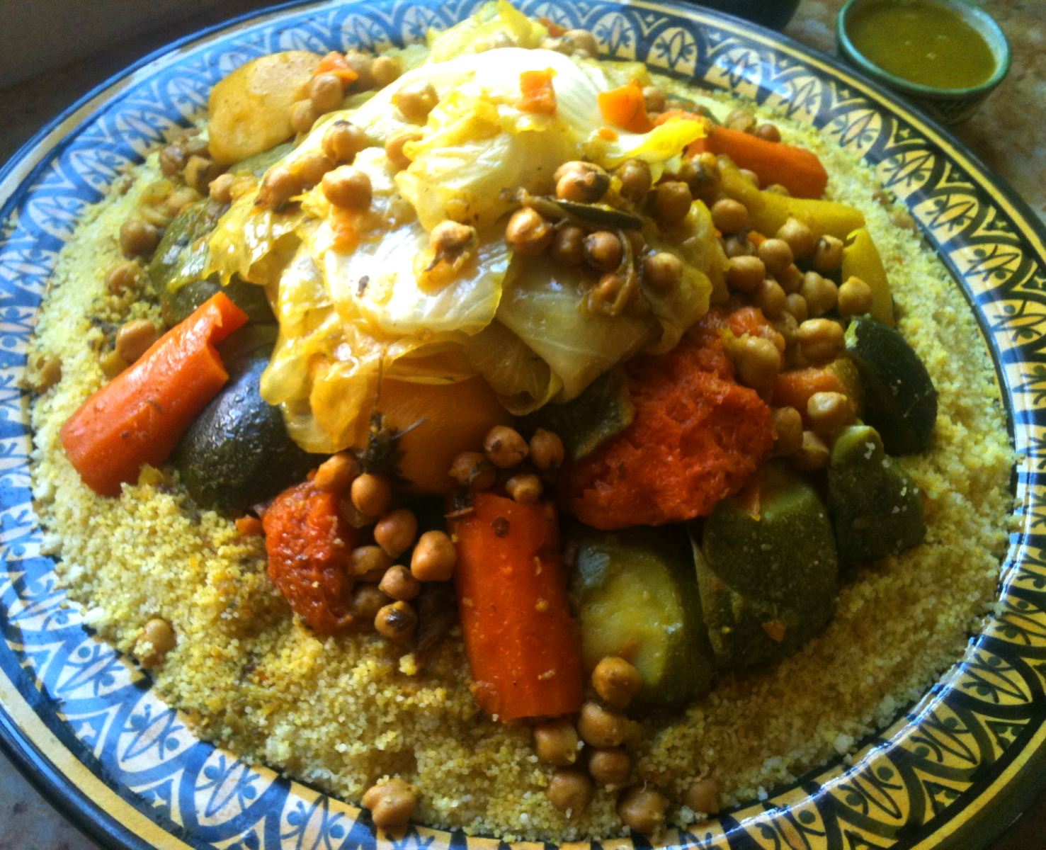 Rent a car in Morocco to go to eat a couscous in a local restaurant